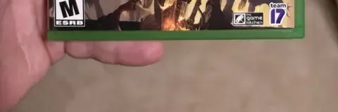 Blasphemous, the ESRB box on its front