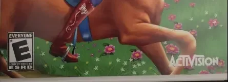Barbie Horse Adventures: Riding Camp, the ESRB box on its front