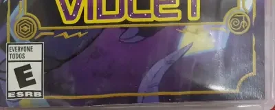 Pokémon Violet, the ESRB box on its front