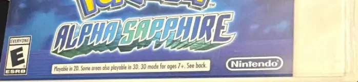 Pokémon Alpha Sapphire, the ESRB box on its front
